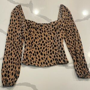 Reformation cheetah print top